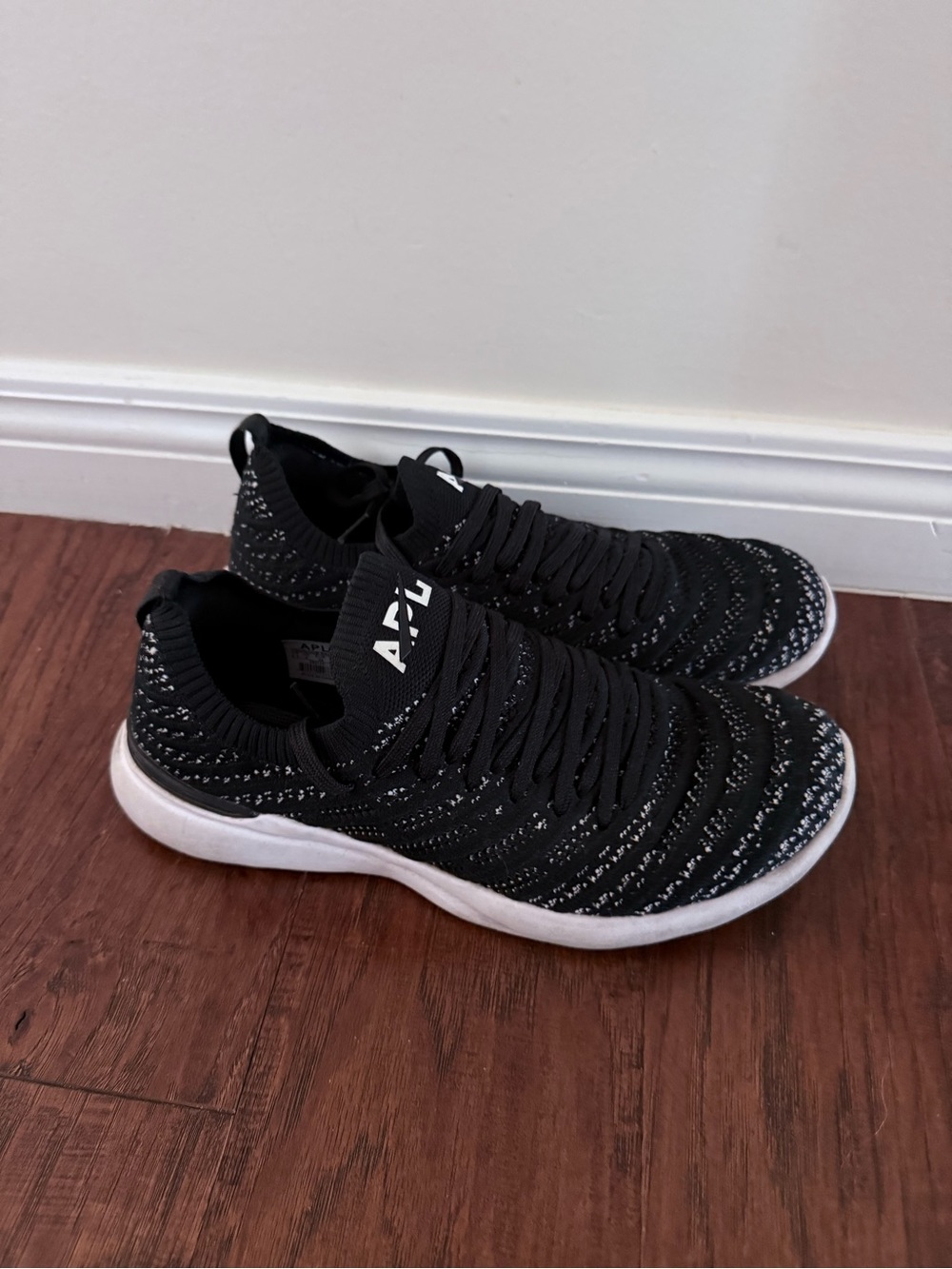 APL  Black Knit Slip-On Sneakers with White Speckle